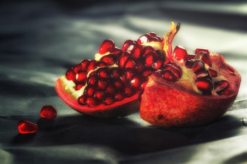 Pieces of ripe pomegranate fruit close-up