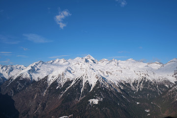 Panoramic aerial view of  Brenta Dolomites, Italy, snow on the slopes of the Alps  Madonna di Campiglio, Pinzolo, Italy. The most popular ski resorts in Italy. Aerial photography with drone