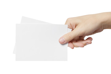 Hand holding blank cards or paper sheets 10x15cm (A6), isolated on white background