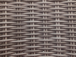 Woven natural furniture texture. Background seamless pattern