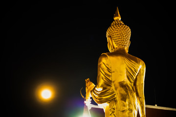 Meditation hand of the golden Buddha with Moon.