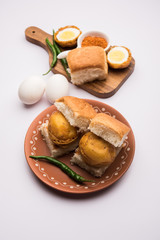 Egg Vada Pav or Anda  Wada Paav / Pao is a non-Vegetarian Fast Food Dish From Maharashtra, India