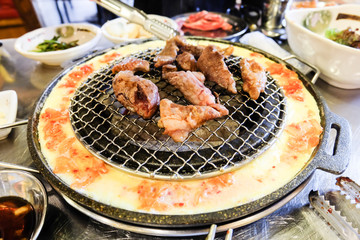 Korean style barbecue pork with cheese and egg.