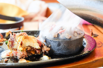 Beef steak in a special hot pan