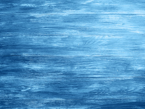Old wooden background toned classic blue color