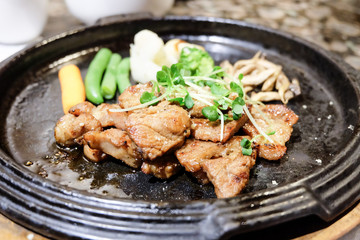Pork Steak with vegetables in hot pan,teppanyaki