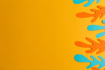 Fototapeta premium orange background of paper orange and blue abstraction, handmade