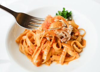 Crab Fettucini on white plate