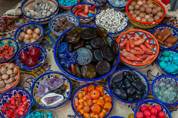 Colors, tastes and flavors of the Middle East in Arab Bazaar on King David's street. Souvenirs on the old arabic market in Jerusalem