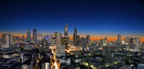 Modern building and panoramic city skyline view over Bangkok business district Sathorn and Silom with MahaNakhon tower the  tallest building in Thailand, Silom area at twilight