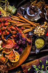 Top view Thai spices and herbs ingredient decoration on wood table for cook in home kitchen. 