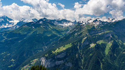 Naklejka na ściany i meble Switzerland, Panoramic view on green Alps from Schynige Platte