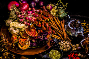 Top view Thai spices and herbs ingredient decoration on wood table for cook in home kitchen. 