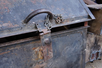 Metal hasp and staple  on old metal box