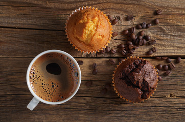 Coffee cup and two muffins