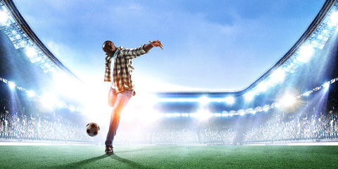 Fototapeta na wymiar Soccer man in action with ball. Mixed media