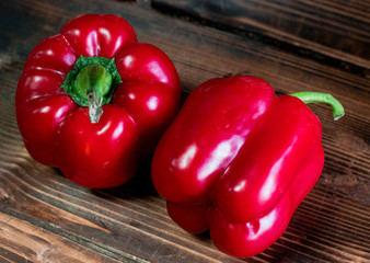 red bell pepper paprika on wood background
