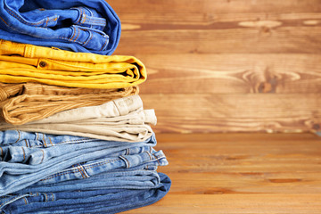 Stack of warm clothes on table