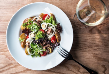 healthy delicious salad with wite wine