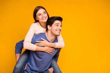 Lovely romantic passionate two people married couple have fun dating look copyspace man piggy-back...
