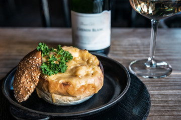 Julienne in a bun with wine