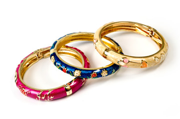 Naklejka premium metal, round, women's multi-colored bracelets on a hand