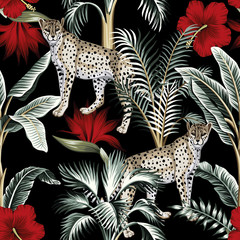 Tropical vintage botanical banana tree, palm tree, red hibiscus flower and leopard floral green palm leaves seamless pattern black background. Exotic jungle wallpaper. © good_mood