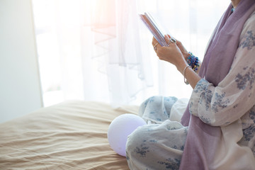 Fototapeta premium The fortune teller is using cards and crystal glass balls to see the fortune on the horoscope table.