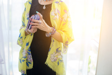 The fortune teller is using cards and crystal glass balls to see the fortune on the horoscope table.