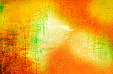  Texture of an ancient wall of yellow orange and green, illuminated from the inside