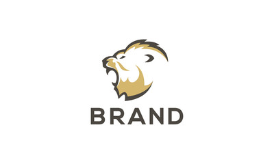 Dynamic and powerful lion head logo in a roaring pose.
