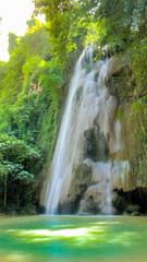 waterfall in tropical rain forest