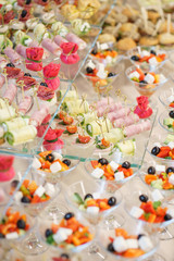 Fototapeta na wymiar Catering and guest meals during the event. Quick mini snacks in a special beautiful dish.