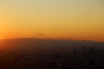 Beautiful city landscape looking view Fuji from Tokyo city in the sunrise or sundown colorful in the evening.