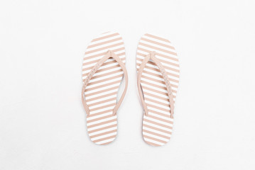Female flip flops shoes isolated on the white background.