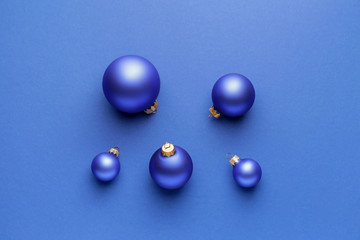 Beautiful Christmas balls on color background