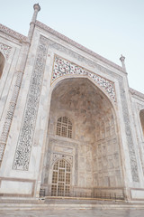 Fototapeta na wymiar Taj Mahal side arch. Architecture of India. New wonder of the world
