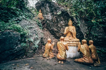 Fotobehang Buddha at Mount Phou Si, also written Mount Phu Si, is a 100 m high hill in centre of the old town of Luang Prabang in Laos © diy13