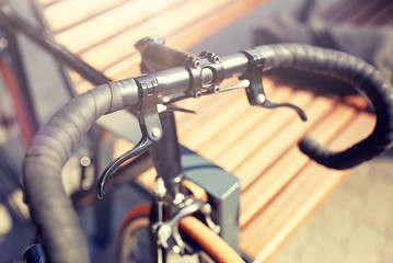 transport and vehicle concept - close up of fixed gear bicycle on street