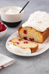 Cake with raspberries and whipped cream. Copy space.