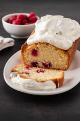 Cake with raspberries and whipped cream. Copy space.