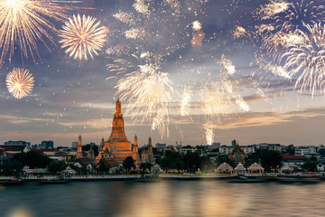 Wat Arun temple in bangkok with fireworks. New year and holiday concept.