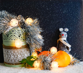 Christmas decorations on a dark background. Christmas rat Symbol of the new year 2020. Christmas card. Chinese New Year 2020. Christmas toys, bokeh. Happy New Year. New Year concept. Rat on the backgr