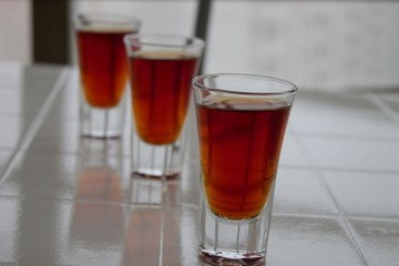 Cognac in glasses. Shots. Alcohol. Bar. The drinks. Whiskey