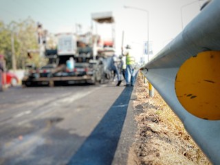 Road construction by method Hot Mix Asphalt Recycling, Blurred images