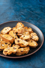 Biscotti with almond, walnuts and cranberry. Delicious cantucci cookies.