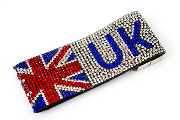 Fototapeta na wymiar Great Britain flag bracelet inlaid with irregularly shaped stones with incredible brilliance