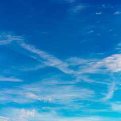 Fantastic clouds against blue sky, square