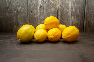 juicy ripe lemons on the board