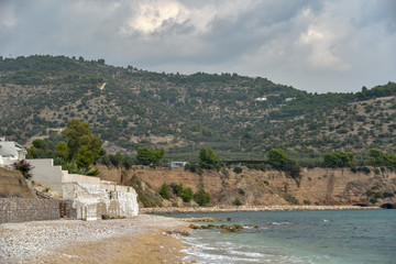 Mattinata Coast by Morning with Cloudy Sky and Gargano Promontory View
